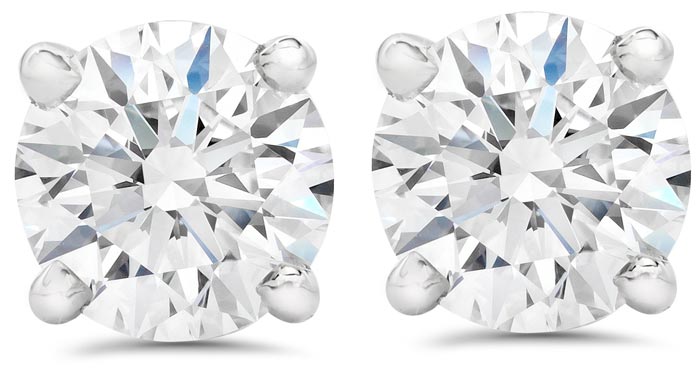 close up top view pair of diamond stud earrings