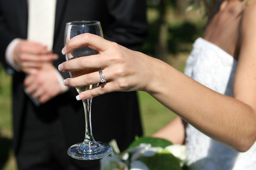 bride with engagement ring set