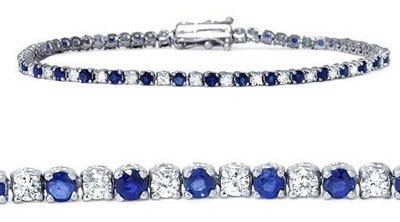 silver diamond tennis bracelet with blue gemstones