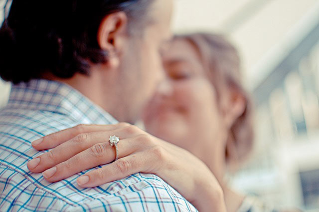 showing engagement ring