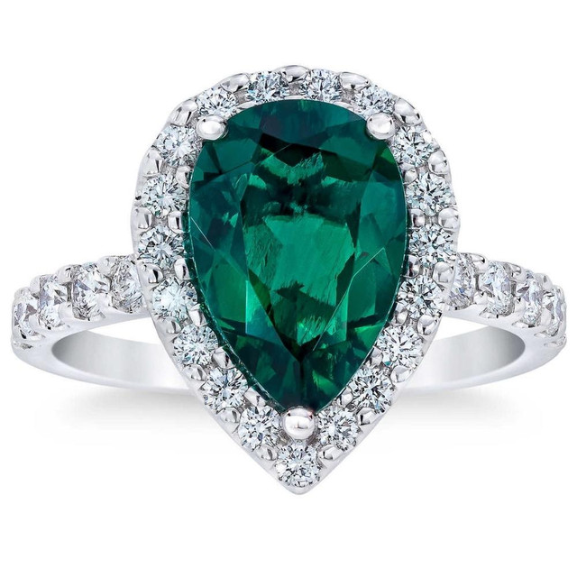 white gold pear shape emerald and lab-grown diamond halo engagement ring