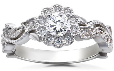 four prong round diamond engagement ring with scroll detail
