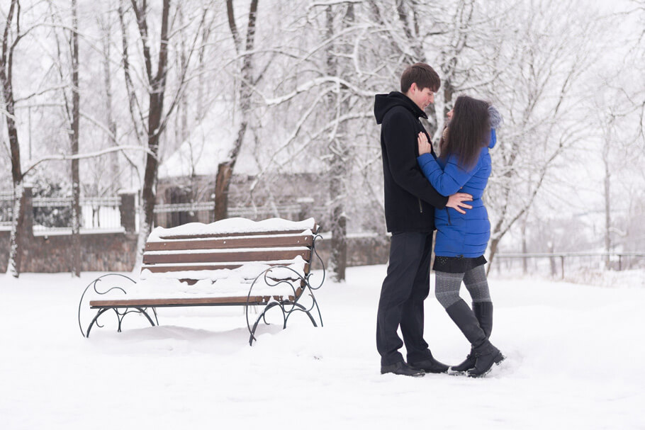 couple outdoors for a winter proposal