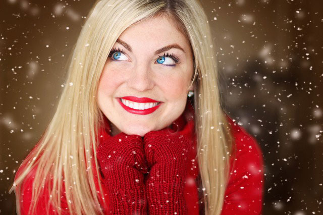 woman smiling in the snow