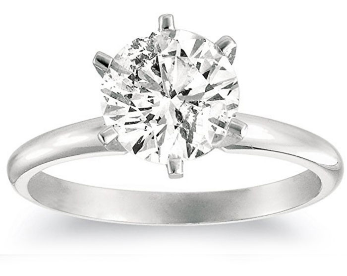 woman’s solitaire engagement ring